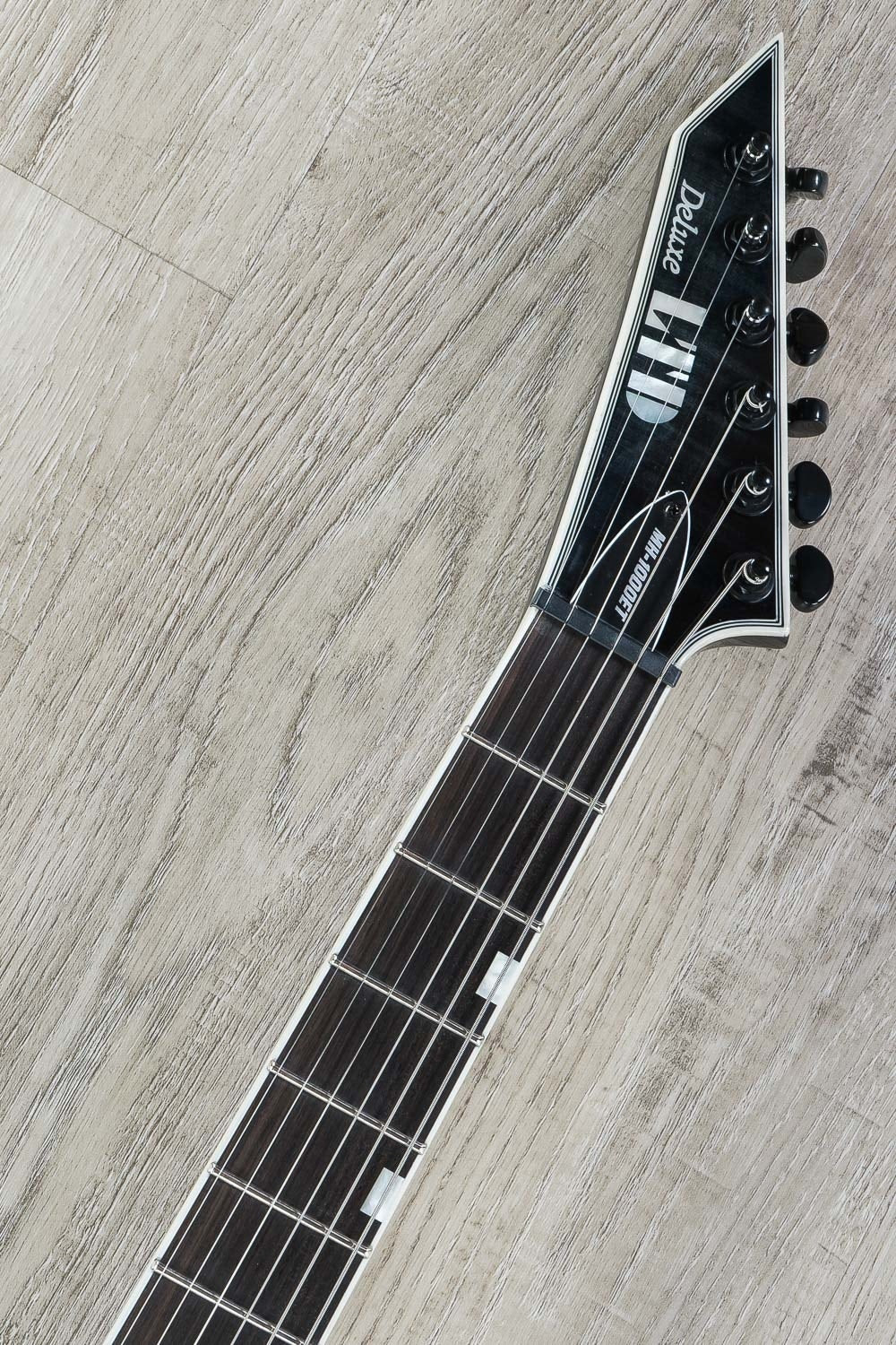 ESP LTD MH-1000 Evertune Left-Handed Electric Guitar, Flamed Maple Top - See Thru Black