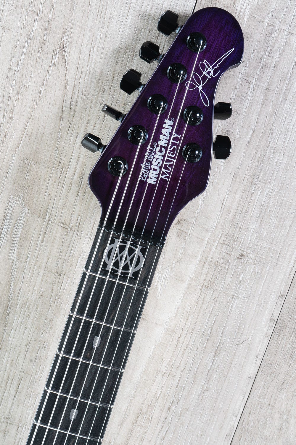 Ernie Ball Music Man Monarchy Series Majesty 7 - 7-String Electric Guitar, Ebony Fretboard, Hard Case - Majestic Purple