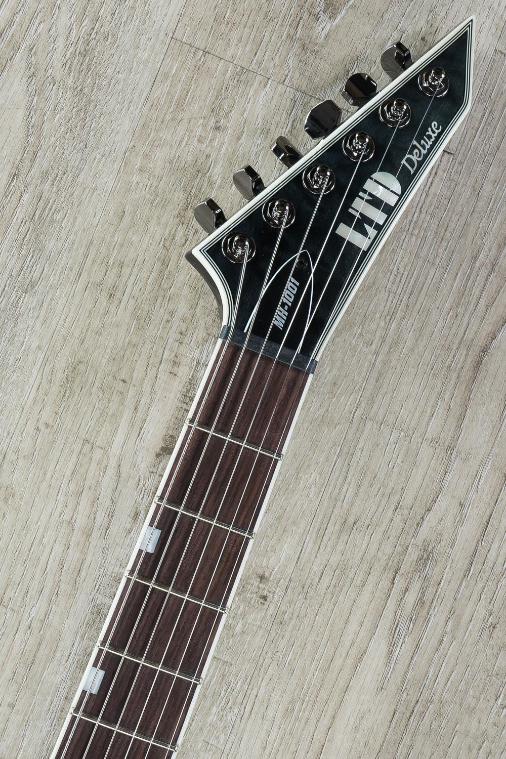 ESP LTD MH-1001NT Electric Guitar, Quilted Maple Top, Rosewood Fingerboard - See Thru Black