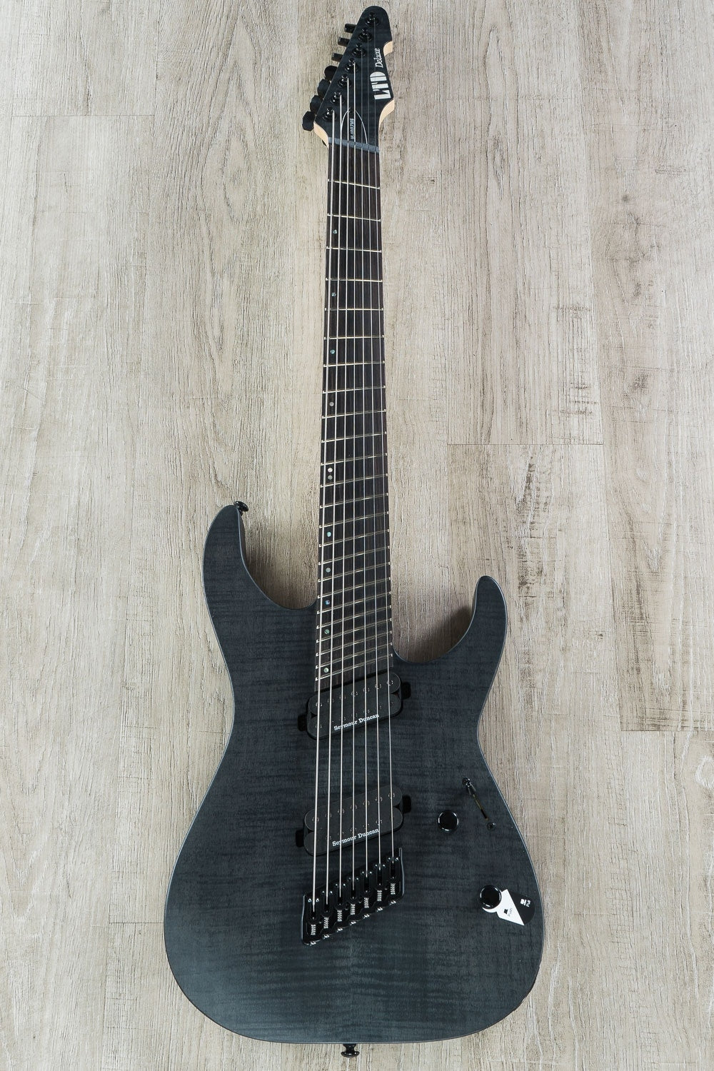 ESP LTD M-1007 Multi-Scale 7-String Electric Guitar, Flamed Maple Drop Top - See Thru Satin Black