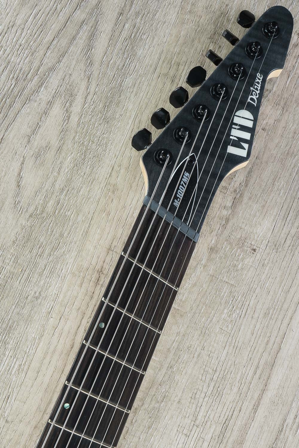 ESP LTD M-1007 Multi-Scale 7-String Electric Guitar, Flamed Maple Drop Top - See Thru Satin Black