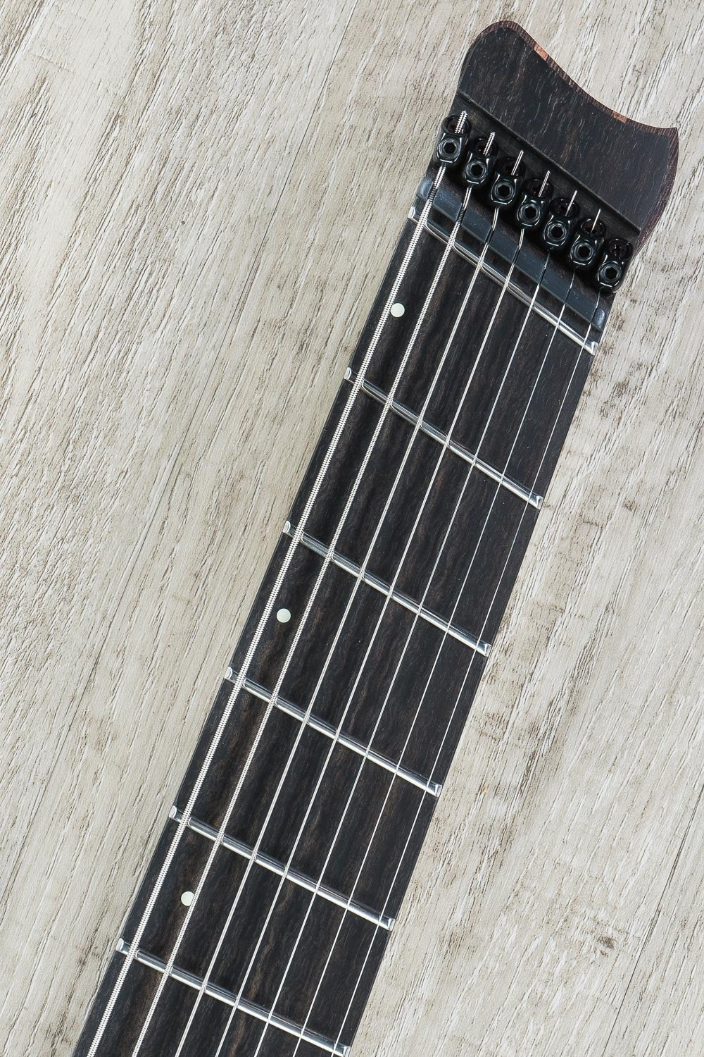 Skervesen Shoggie 7 FF Headless Multiscale 7-String Electric Guitar, Poplar Burl Top, Hard Case - Silver Blue Fade